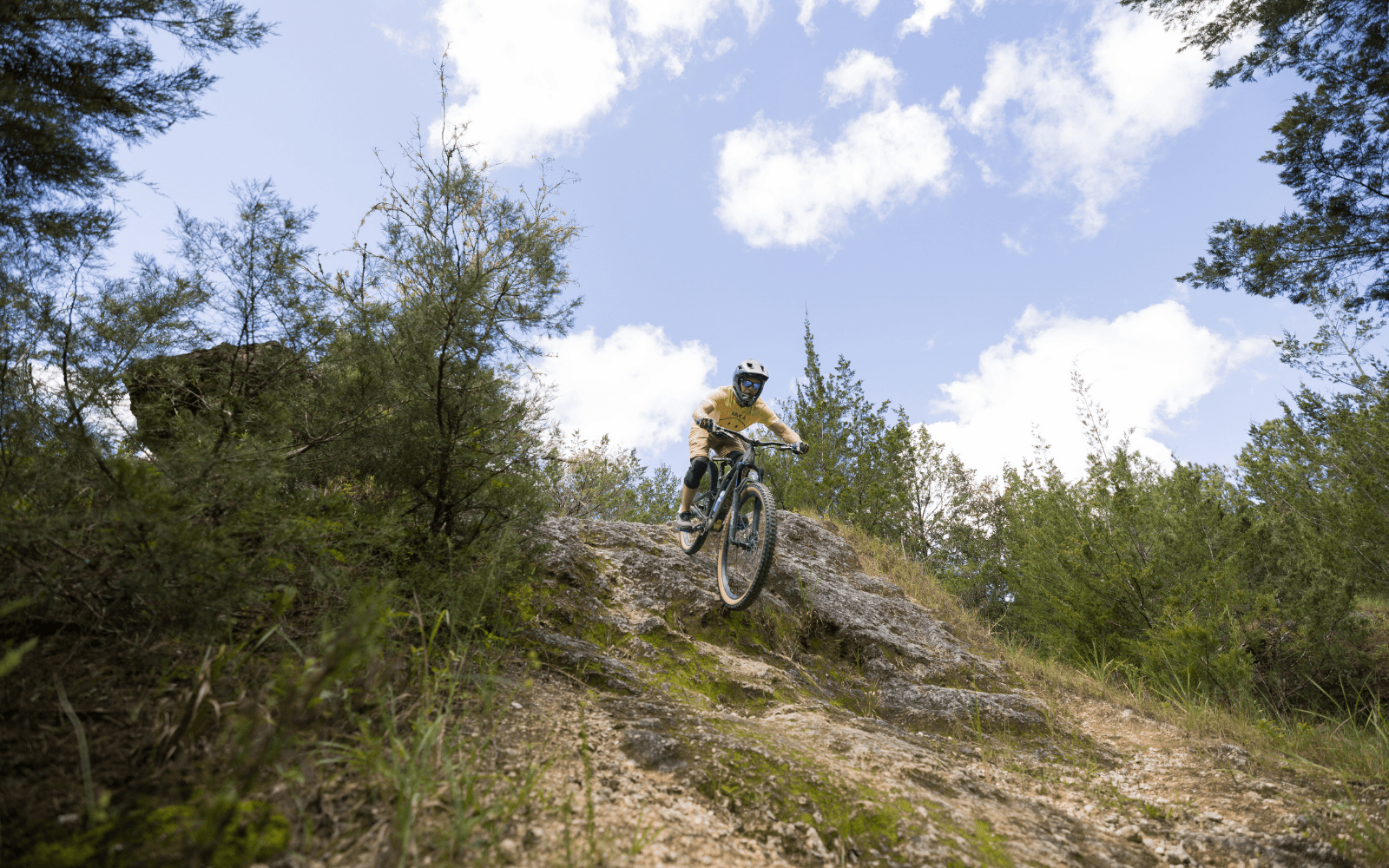 Group riders enjoying a guided trail experience together on a Florida mountain bike tour
